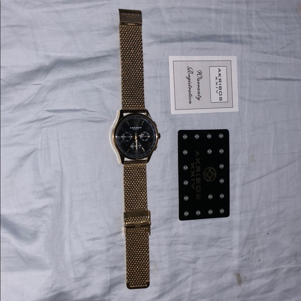 Akribos XXIV gold watch